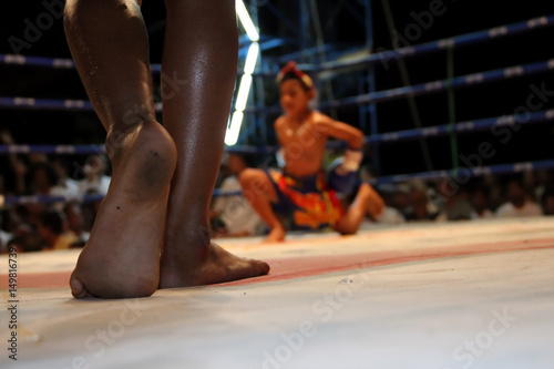Child boxer,Muay Thai.Real shot with night scene.
