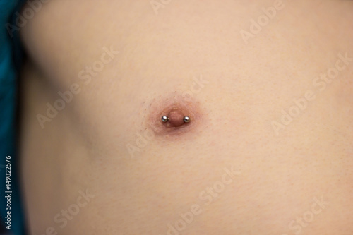 Pierced male nipple photo