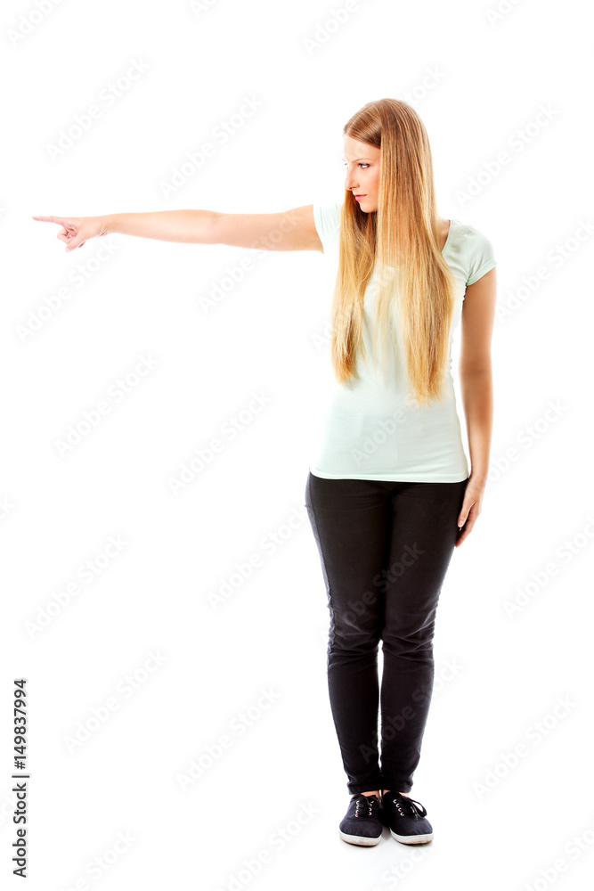 Attractive woman looking and pointing sideways. Attractive woman looking and pointing sideways.