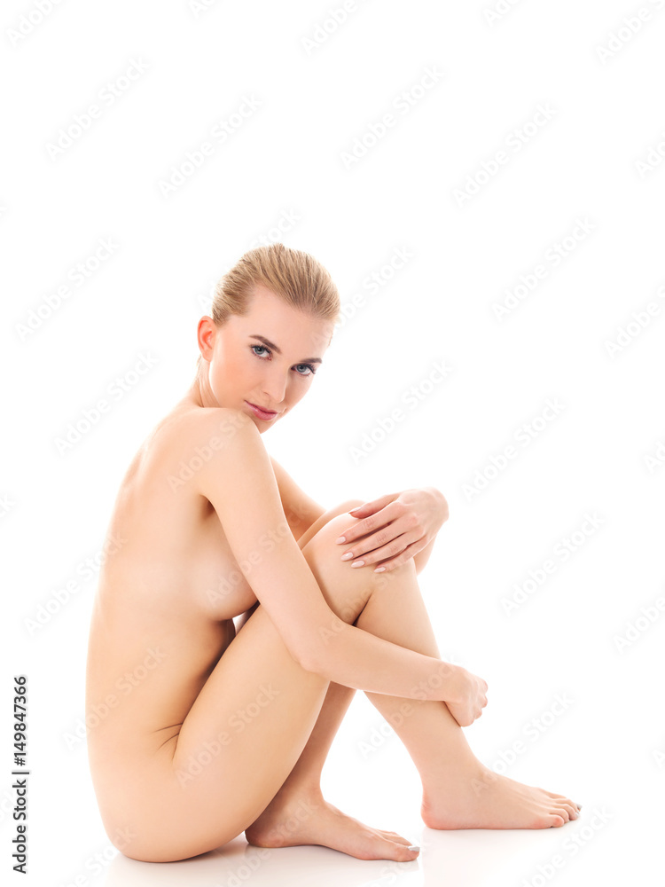 Beautiful nude woman sitting on flor Beautiful nude woman sitting on flor