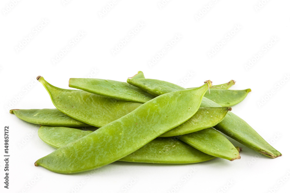 Green peas (Pisum sativum) isolated in white background Green peas (Pisum sativum) isolated in white background