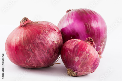 Red bulb onion (Allium cepa) isolated in white background
