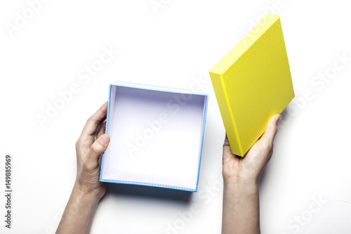 woman hand hold a gift box isolated white. photo