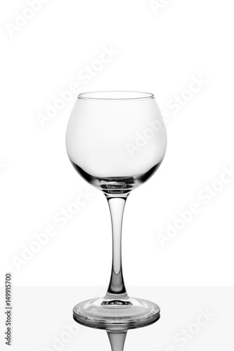 Empty wine glass isolated on white