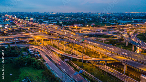 Bangkok Expressway top view, Top view over the highway,expressway and motorway at night, Aerial view interchange of a city, Shot from drone, Expressway is an important infrastructure in Thailand photo