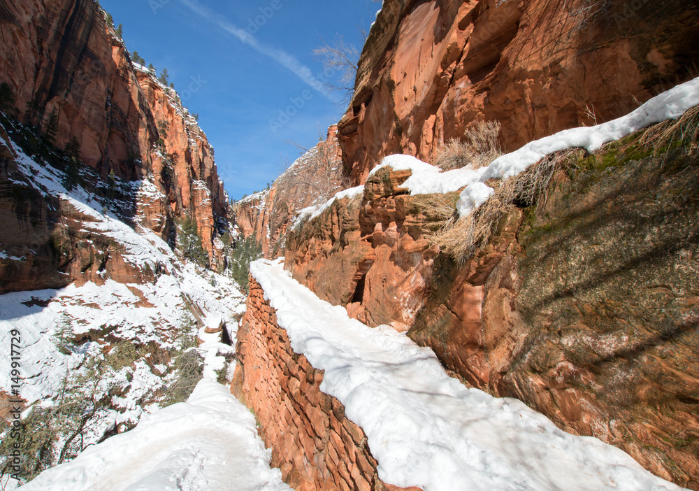 Snow on Switchbacks on Angels Landing Hiking Trail during winter in Zion National Park in Utah USA