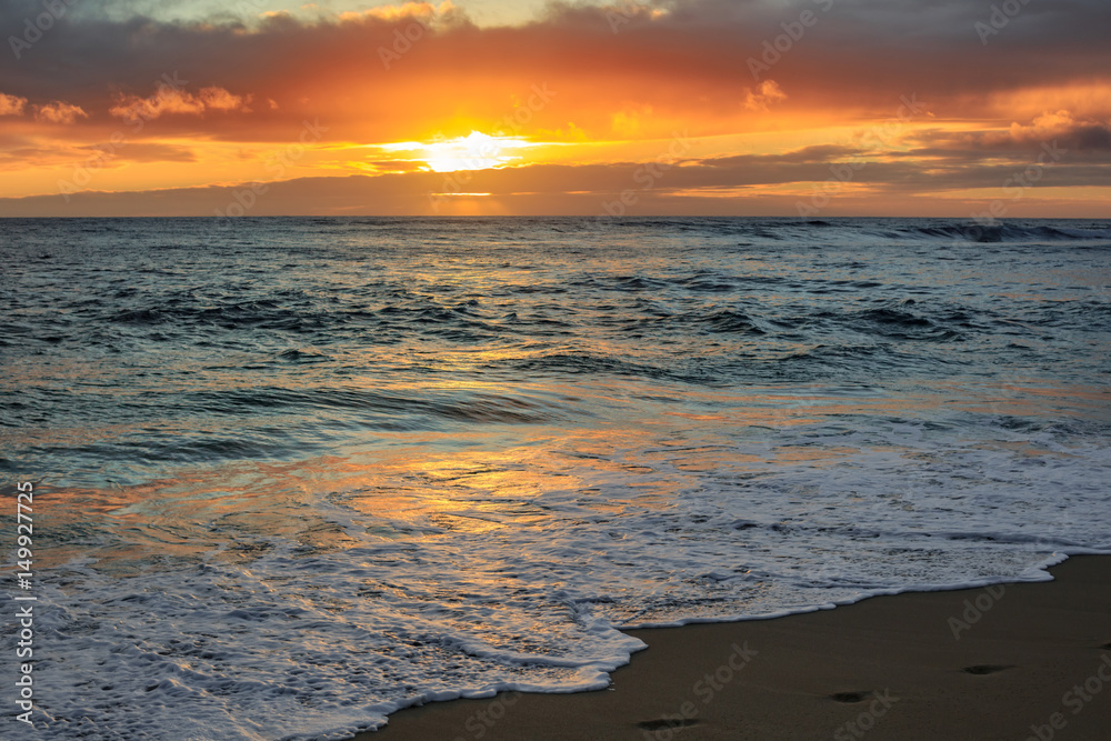Beautiful sunset time on hawaiian beach with ocean view seascape