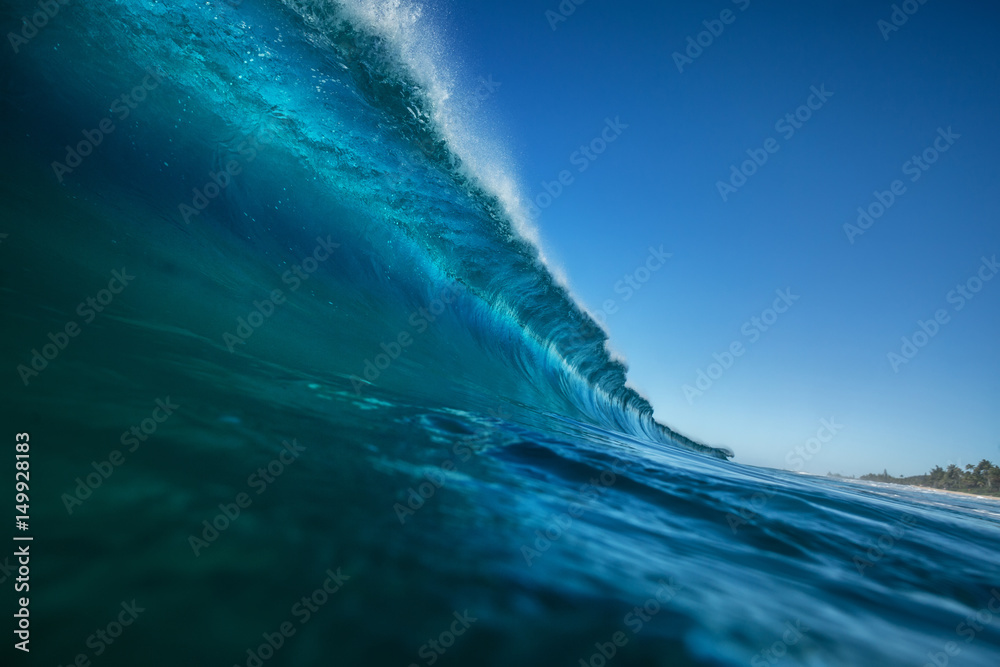 Big bright ocean surfing wave. Surfline rip curl rising