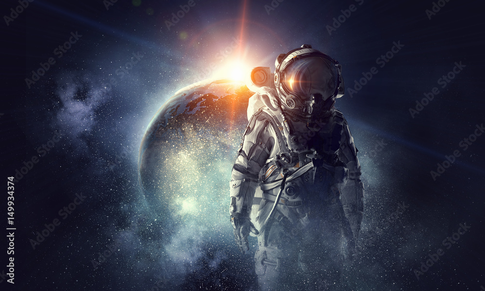 Obraz premium Astronauta w kosmosie. Różne środki przekazu