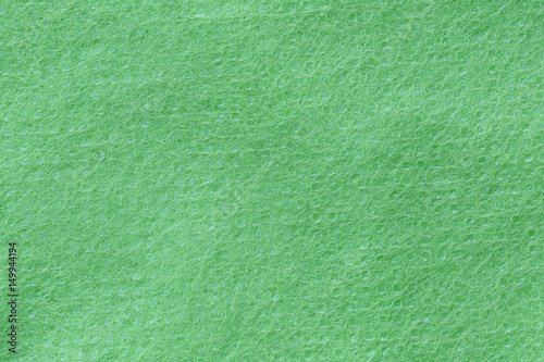 Texture of green strand fabric.