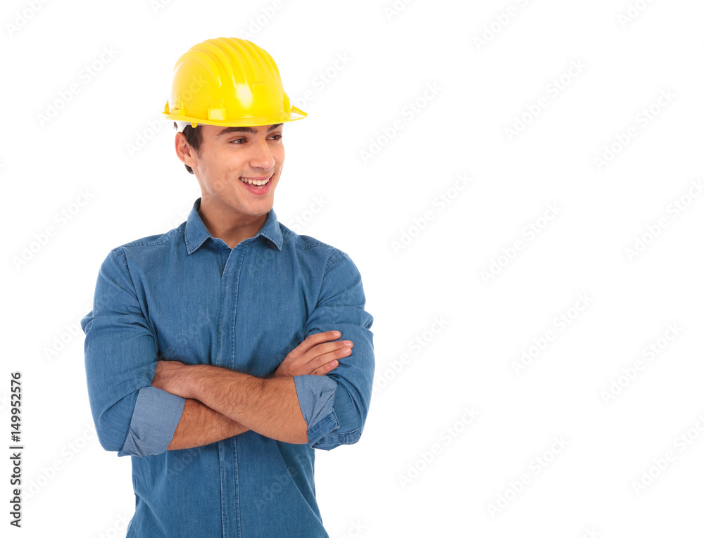 confident construction engineer smiles and looks away to side confident construction engineer smiles and looks away to side