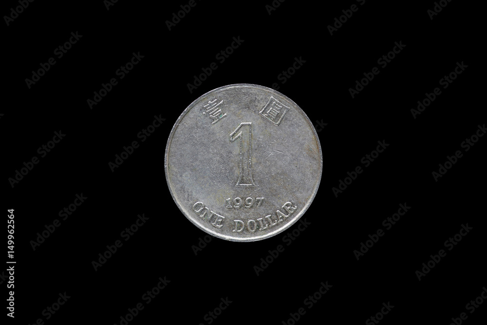 One dollar hongkong 1997 coin isolated on black background.
