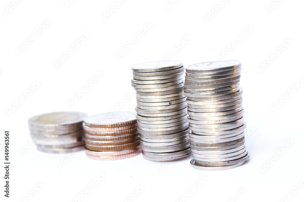 Four stacks coins row on white background,Business and finance Four stacks coins row on white background,Business and finance