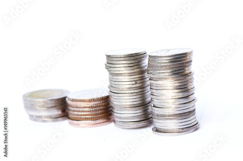 Four stacks coins row on white background,Business and finance