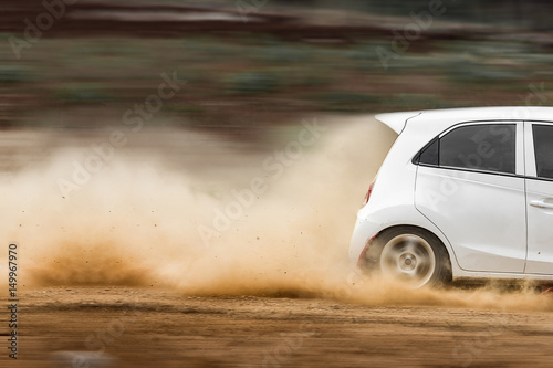 Rally car in dirt track