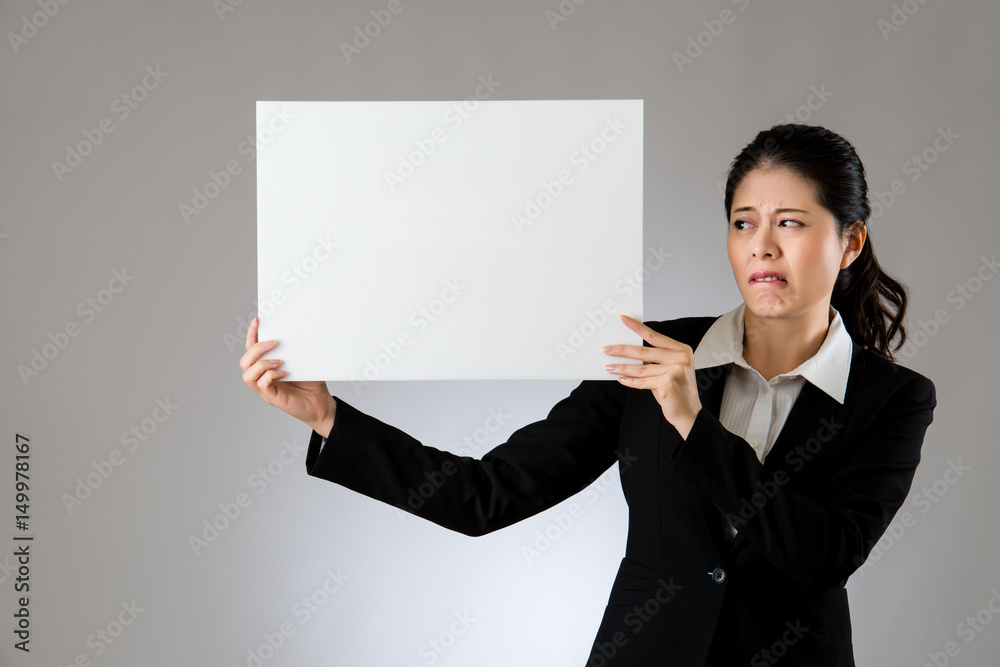 Banner woman holding billboard blamed and scared Banner woman holding billboard blamed and scared