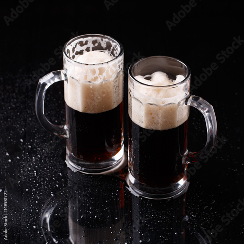 Beer on empty black table