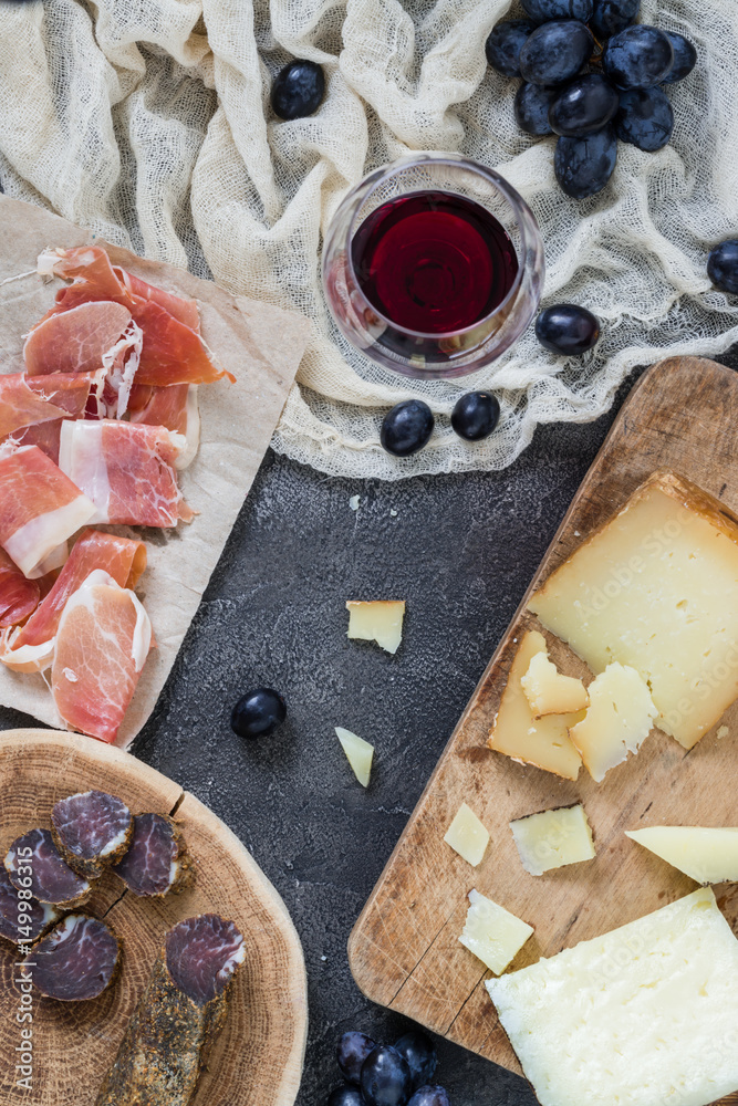 Platter with hard cheeses (Italian pecorino toscano and Spanish