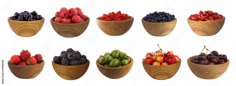 different berries isolated on white background. Collage of fruits and berries: blueberry, blackberry, cherry, strawberry, currant and raspberry. Collection of fruits and berries in a bowl.