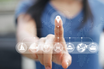Woman touching icon travel online network connection on screen, travel concept