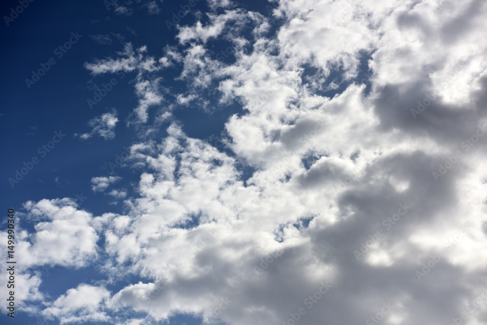 White clouds on dark blue sky White clouds on dark blue sky