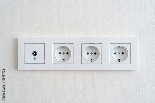 Electrical sockets on a wall photo