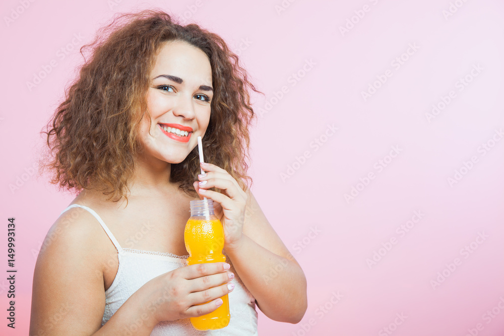 Beautiful woman drink fresh cold orange summer juice Beautiful woman drink fresh cold orange summer juice