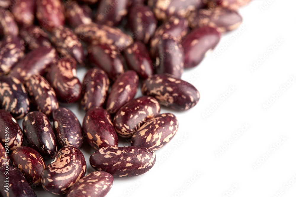 Dark Spotted kidney bean isolated on white background. Dark kidney bean texture background. A large bean with a subtle sweet flavor and soft texture. Beans. Proper nutrition. Vitamins. Healthy food.