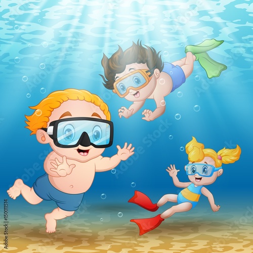 Three kids swimming and diving underwater 