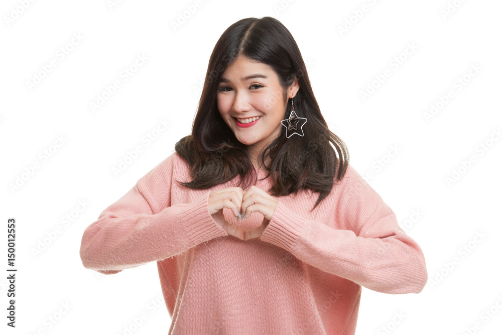 Young Asian woman show heart hand sign. Young Asian woman show heart hand sign.