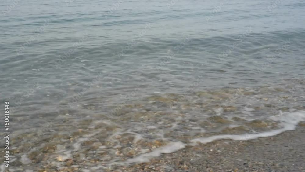 Beach and waves with foam