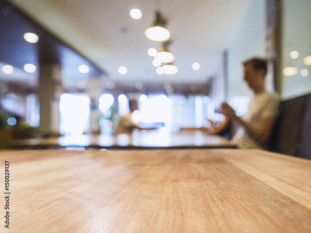 Table top with Blurred Bar restaurant cafe interior background
