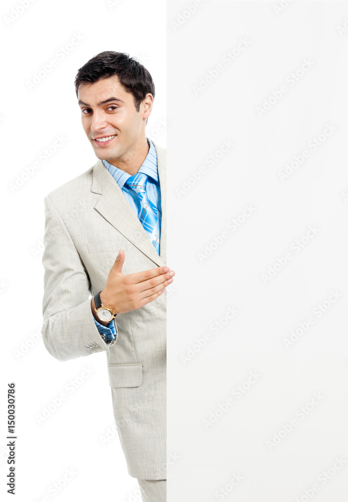 Businessman showing signboard, isolated Businessman showing signboard, isolated