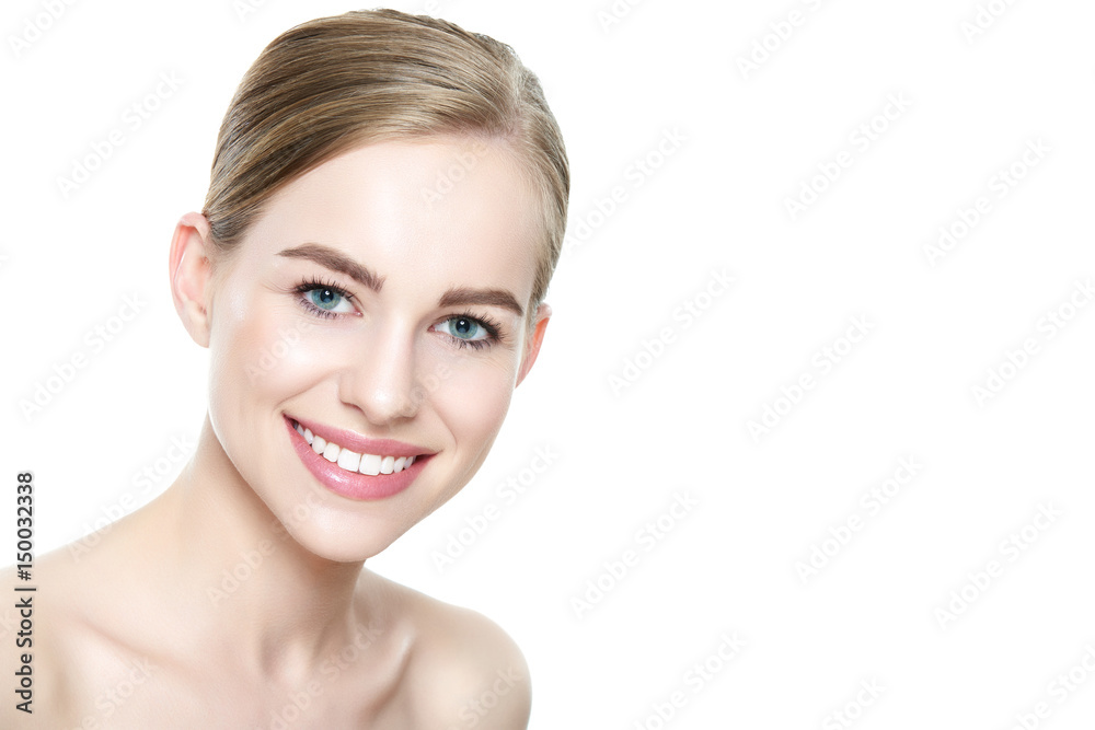 Beautiful young blond smiling woman with clean skin, natural make-up and perfect white teeth white background Beautiful young blond smiling woman with clean skin, natural make-up and perfect white teeth white background