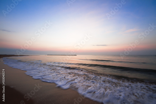 Blurred wave and beach during sunrise, Petchaburi province, south of Thailand