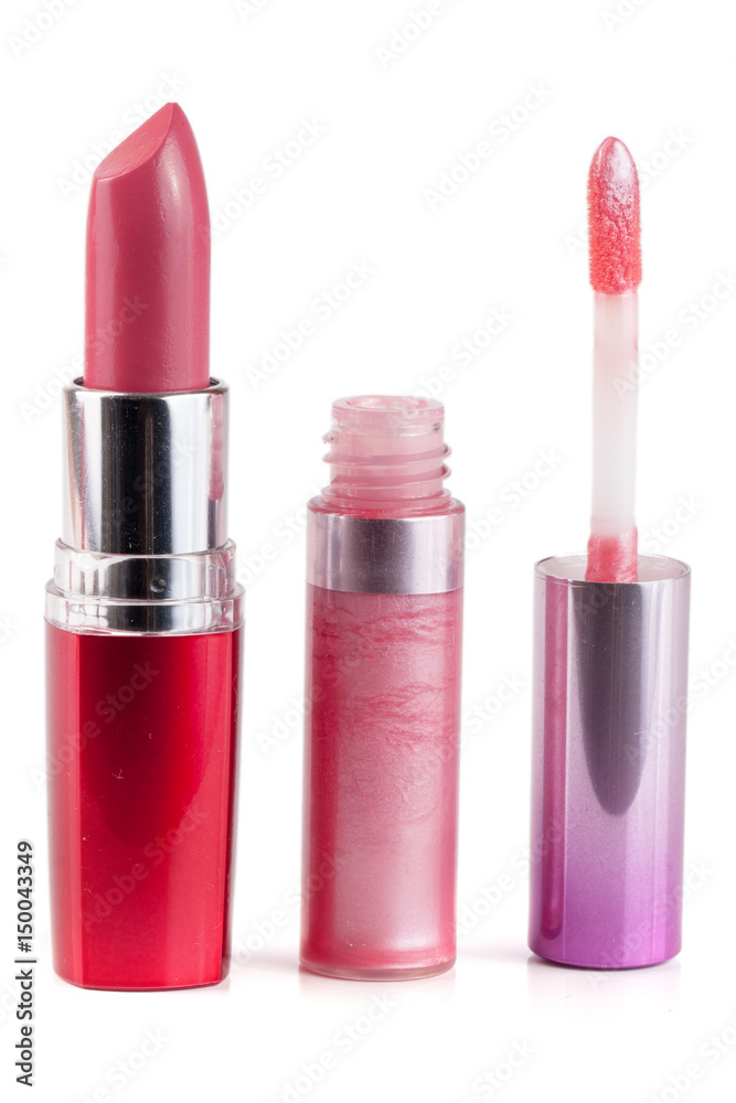Pink lipstick and lip gloss isolated on white background