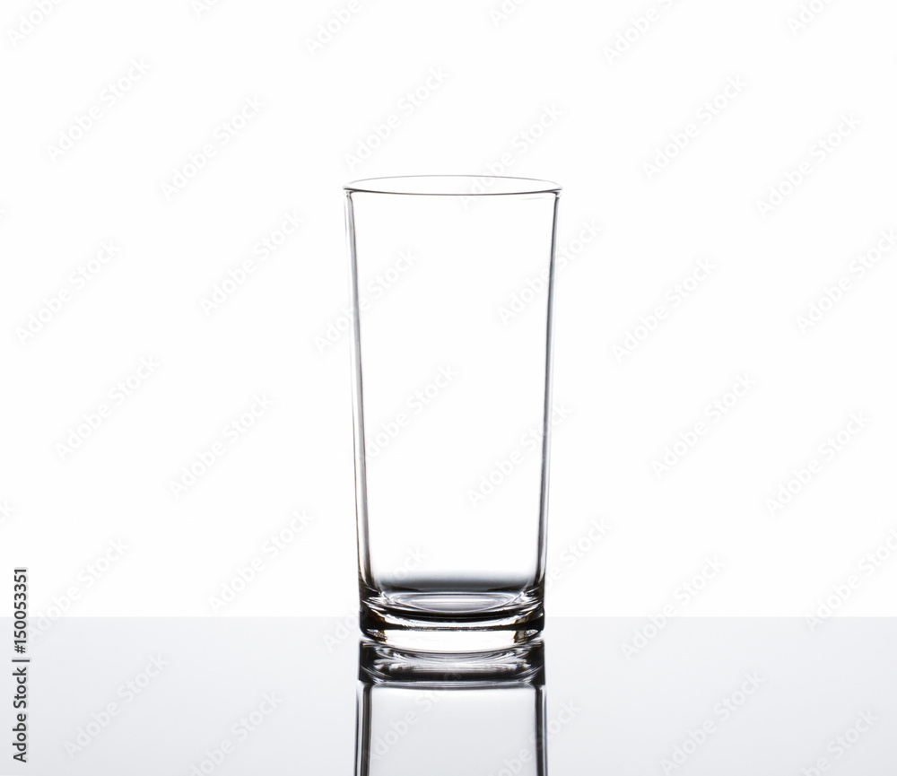 Clean empty drinking glass on white background Clean empty drinking glass on white background