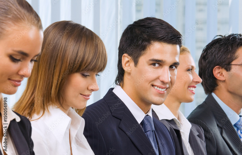 Businesspeople at meeting, presentation or conference Businesspeople at meeting, presentation or conference