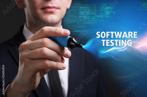 Business, Technology, Internet and network concept. Young businessman working on a virtual screen of the future and sees the inscription: Software testing