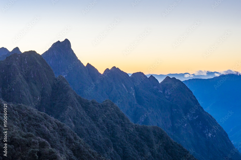 Colorful sunset over the mountains view on the way to Fansipan (Fan Si Pan or Phan Xi Pang) - the highest mountain in Indochina located in Hoang Lien Son mountain range, Lao Cai Province, Vietnam Colorful sunset over the mountains view on the way to Fansipan (Fan Si Pan or Phan Xi Pang) - the highest mountain in Indochina located in Hoang Lien Son mountain range, Lao Cai Province, Vietnam