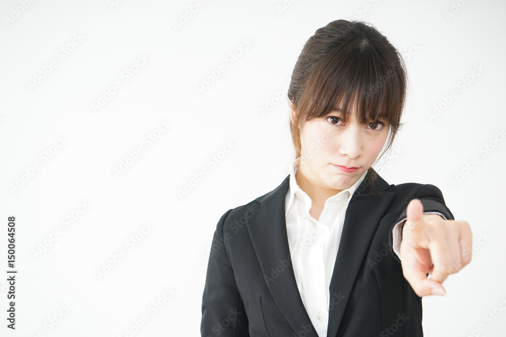 Business women pointing to something with anger Business women pointing to something with anger