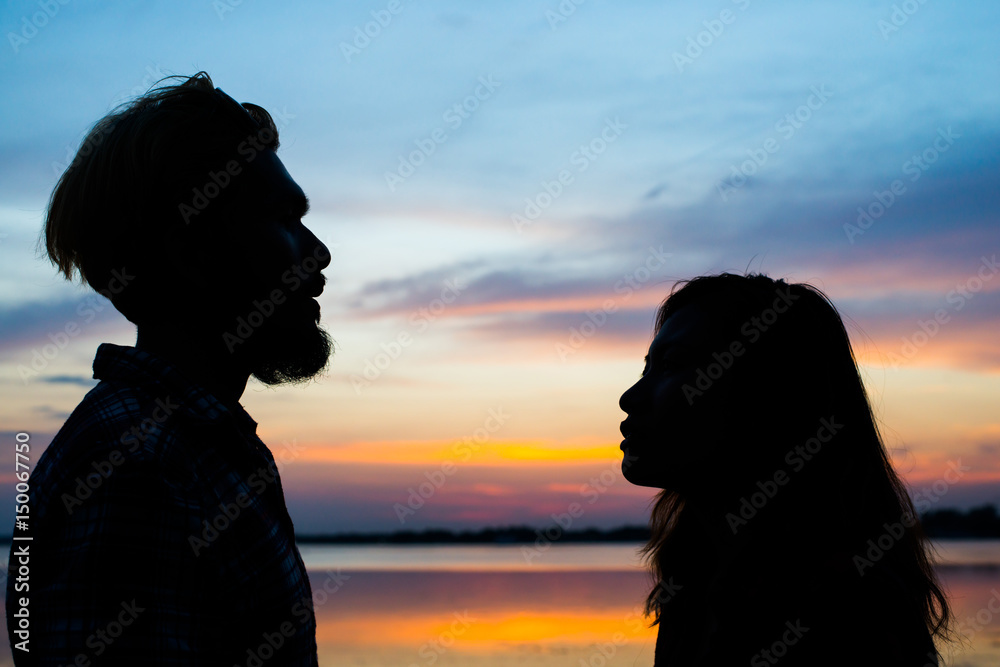 Siluette couple at  sunset.