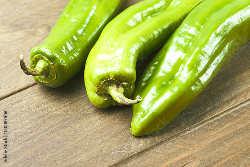 Close-up of ppetizing green peppers. Horizontal shoot.. photo