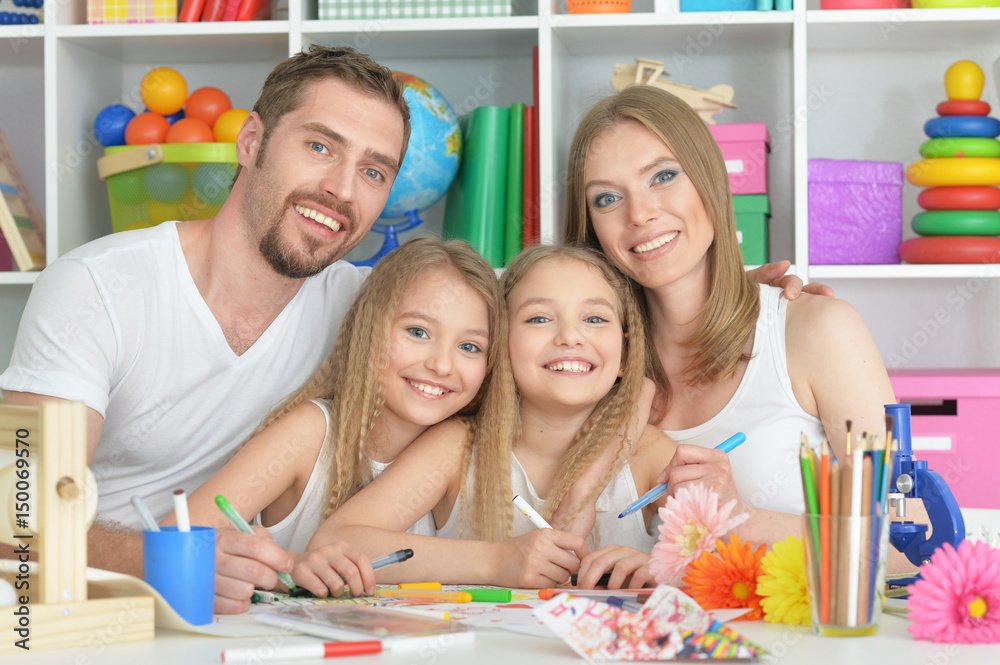 Fototapeta premium Happy parents with children at home