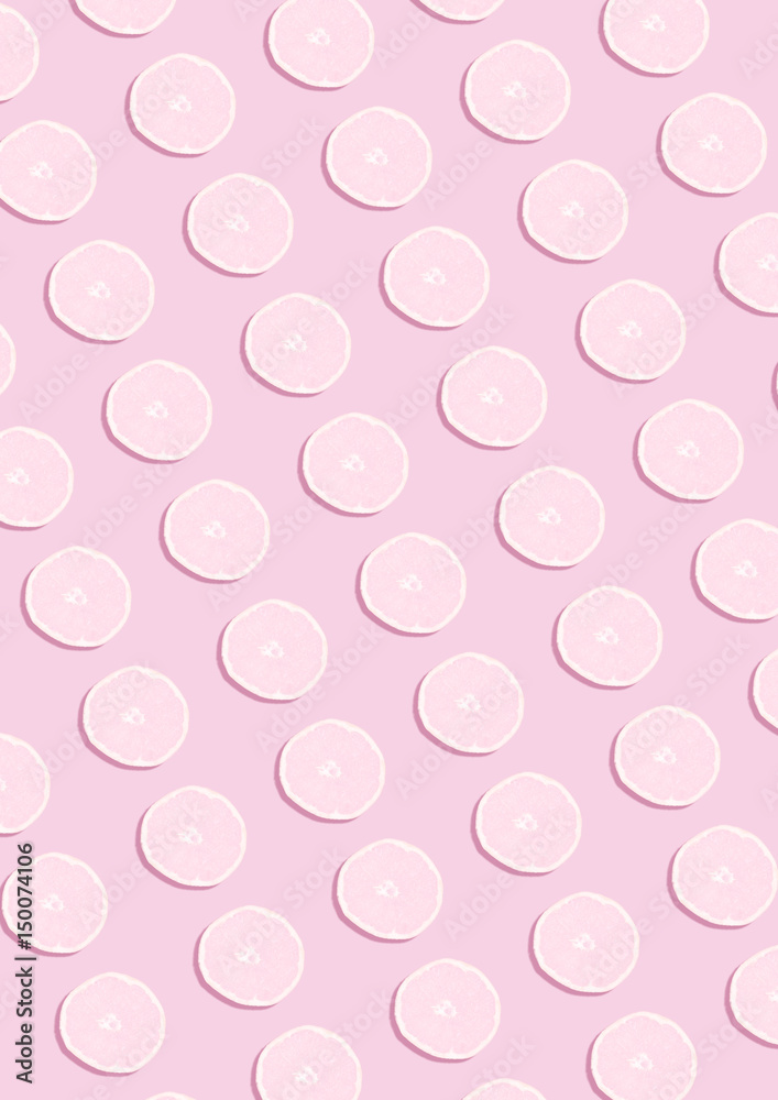 The lemon pattern on pink background. Minimal concept. The lemon pattern on pink background. Minimal concept.