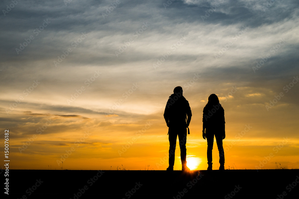 Silhouette of couple traveler.