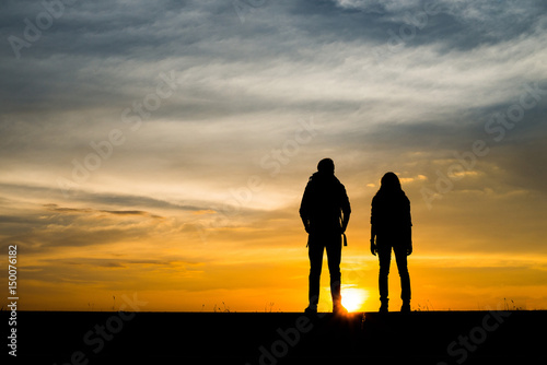 Silhouette of couple traveler.