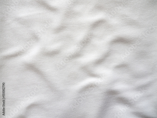 Abstract background white silk fabric with beautiful waves..