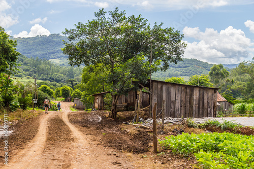 Trekking in dirt road photo