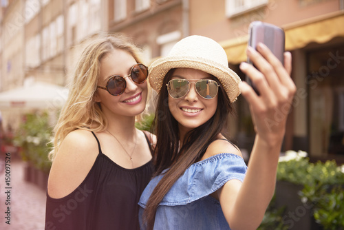 Taking selfie by two womens while traveling